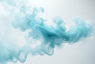 The primary subject of the image is a blue smoke or mist, which appears to be a digital art or illustration. The setting is a white background, which provides a clean and minimalist appearance. The visual style is modern and artistic, with the blue smoke or mist as the main focus. The colors and mood of the image are predominantly blue, creating a calm and serene atmosphere.