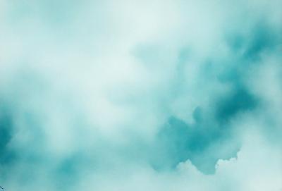 The primary subject of the image is a cloudy sky. The setting is a blue cloudy sky, which serves as the backdrop for the scene. The visual style of the image is a photo, capturing the beauty of the cloudy sky. The colors and mood of the image are predominantly blue, creating a serene and calming atmosphere.