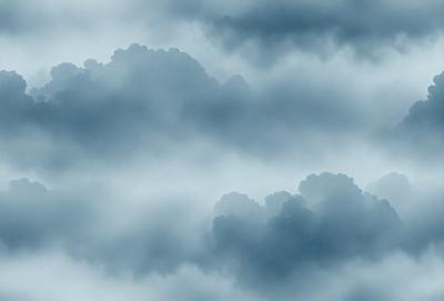 The primary subject of the image is a cloudy sky with a few clouds scattered throughout. The setting is a blue sky, and the visual style appears to be a photo. The colors in the image are predominantly blue, and the overall atmosphere is calm and serene.