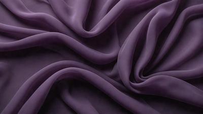 Purple fabric with a flowing pattern.