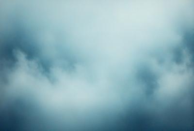 The primary subject of the image is a cloudy sky. The setting is a blue cloudy sky, which serves as the backdrop for the scene. The visual style of the image is a photo, capturing the beauty of the cloudy sky. The colors and mood of the image are predominantly blue, creating a calm and serene atmosphere.