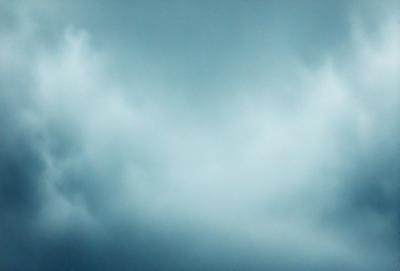 The primary subject of the image is a cloudy sky. The setting is a blue cloudy sky, which serves as the backdrop for the scene. The visual style of the image is a photo, capturing the beauty of the cloudy sky. The colors and mood of the image are predominantly blue, creating a calm and serene atmosphere.