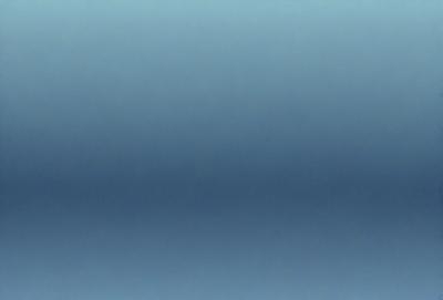 The primary subject of the image is a large, empty, and dark blue sky. The setting is a vast, open space with no visible landmarks or objects. The visual style is a natural, outdoor scene with a focus on the sky. The colors and mood are predominantly dark and moody, with the blue sky creating a sense of vastness and emptiness.