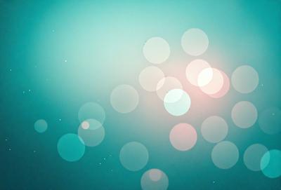 The primary subject of the image is a blue background with a pattern of white circles. The setting appears to be a dark room, and the visual style is a combination of a photo and digital art. The dominant colors are blue and white, creating a calm and serene atmosphere.