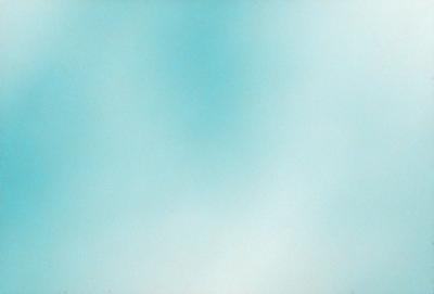 The primary subject of the image is a large, empty, and blue sky. The setting is a vast, open space with no visible landmarks or objects. The visual style is a natural, outdoor scene with a serene and peaceful atmosphere. The colors are predominantly blue, which creates a calm and tranquil mood.