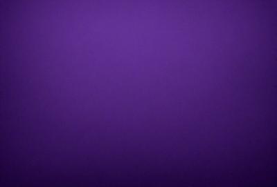Purple background with no visible objects or textures.