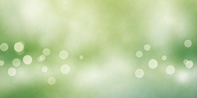 The primary subject of the image is a green background with a few white dots scattered throughout. The setting appears to be a cloudy sky, and the visual style is a combination of a photo and digital art. The colors are predominantly green and white, creating a calm and serene atmosphere.