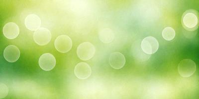 The primary subject of the image is a green background with a pattern of circles. The setting appears to be a natural environment, possibly a forest or a garden. The visual style of the image is a combination of a photo and a digital art, creating a unique and artistic effect. The dominant colors in the image are green and white, giving it a calm and serene atmosphere.