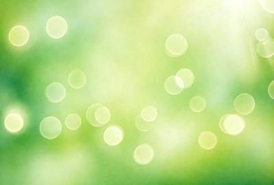 The primary subject of the image is a close-up of a green background with a pattern of yellow circles. The setting appears to be a bright and lively environment, possibly a garden or an outdoor space. The visual style of the image is a combination of a photo and a digital art, creating a unique and vibrant atmosphere. The dominant colors in the image are green and yellow, giving it a fresh and lively mood.