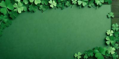 The primary subject of the image is a green background with a pattern of four-leaf clovers. The setting is a green surface, possibly a wall or a piece of paper, with the clovers arranged in a visually appealing manner. The visual style is a combination of a photo and a digital art, as the clovers are arranged in a way that resembles a painting or a drawing. The colors and mood of the image are predominantly green, which gives it a fresh and lively atmosphere.