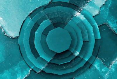 The primary subject of the image is a blue circle with a hole in the center. The setting is a blue background, and the visual style appears to be a digital art or illustration. The dominant colors are blue and white, creating a calm and serene atmosphere.