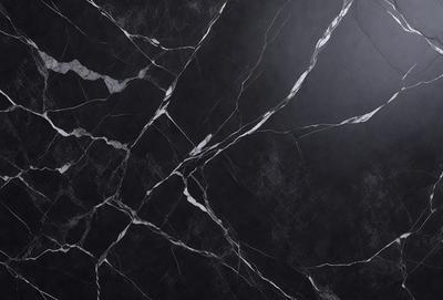 The primary subject of the image is a black and white marble tile wall. The setting is a room with a black background, which emphasizes the marble tile pattern. The visual style is a close-up of the marble tile, showcasing its intricate design. The colors and mood of the image are predominantly black and white, giving it a classic and elegant appearance.