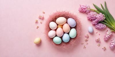 The primary subject of the image is a pink woven basket filled with a variety of colorful eggs. The basket is placed on a pink background, which adds a warm and inviting atmosphere to the scene. The eggs come in different colors, including blue, pink, and yellow, creating a visually appealing and diverse display. The overall mood of the image is cheerful and vibrant, showcasing the beauty of nature and the joy of springtime.