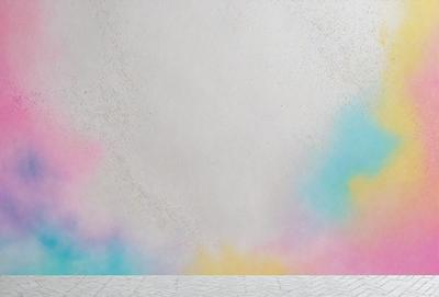The primary subject of the image is a white wall with a colorful, swirling pattern painted on it. The setting is an indoor space, possibly a room or a gallery. The visual style of the image is a combination of digital art and illustration, creating a vibrant and dynamic atmosphere. The dominant colors in the image are pink, blue, yellow, and white, which contribute to the overall mood of the scene.