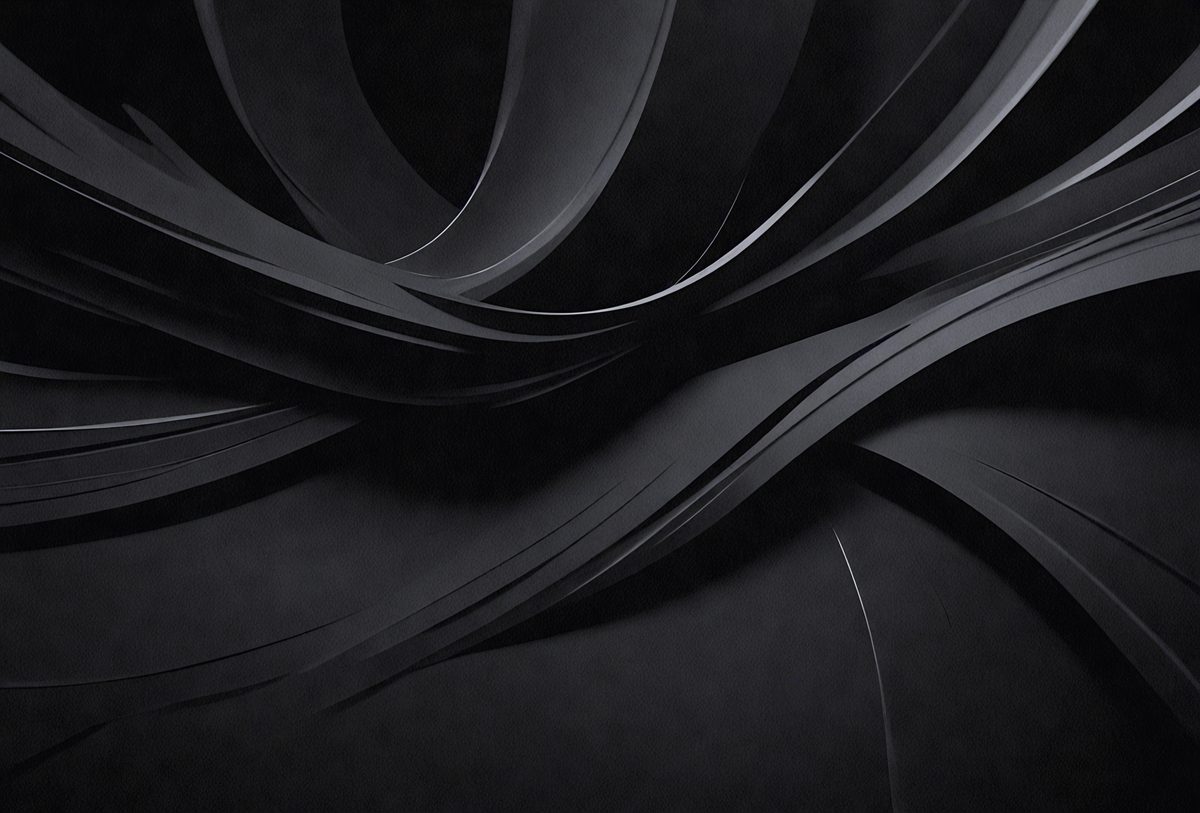 The primary subject of the image is a black and white photograph of a spiral pattern. The setting is a dark room, and the visual style is a close-up of the spiral pattern. The colors and mood of the image are predominantly black and white, creating a sense of depth and contrast.