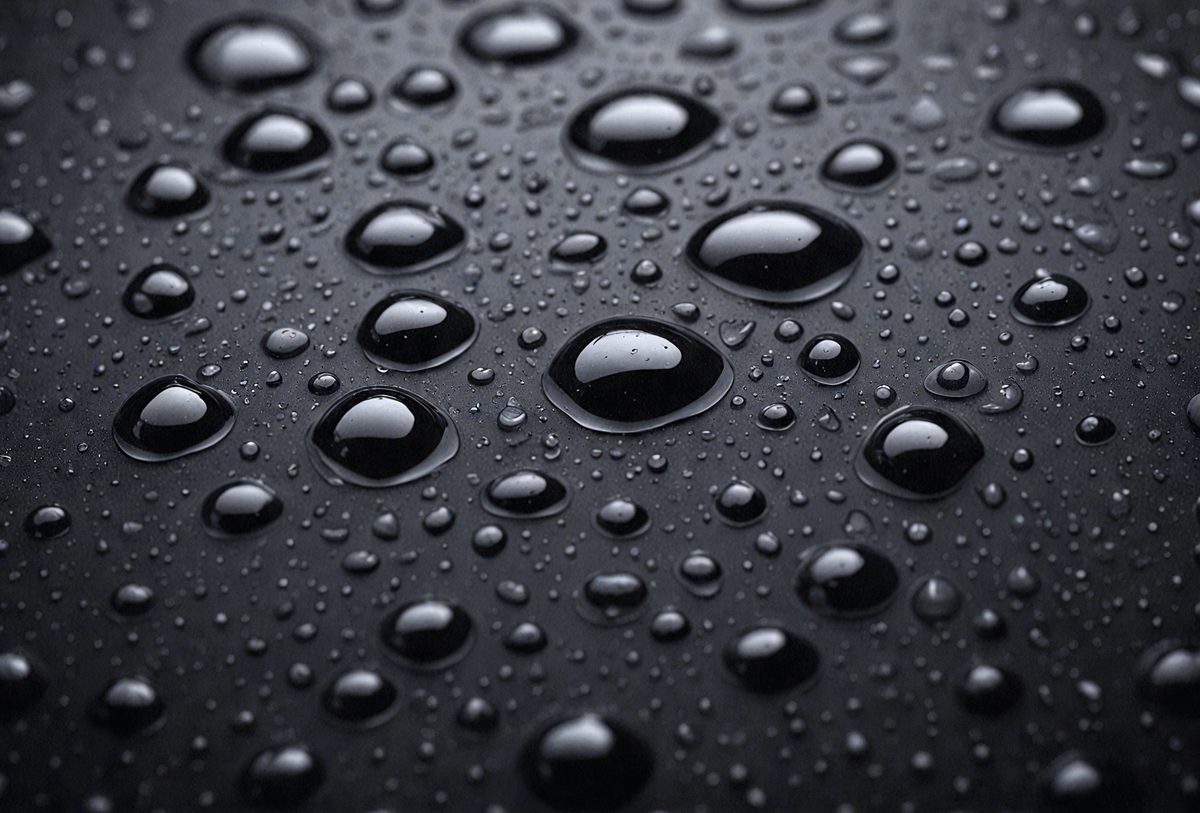 0e763853-dd3a-49d3-9a3a-049756cdecbd-freepik__water-drops-on-a-black-surface-abstract-background__75343_250526014814_00001.png