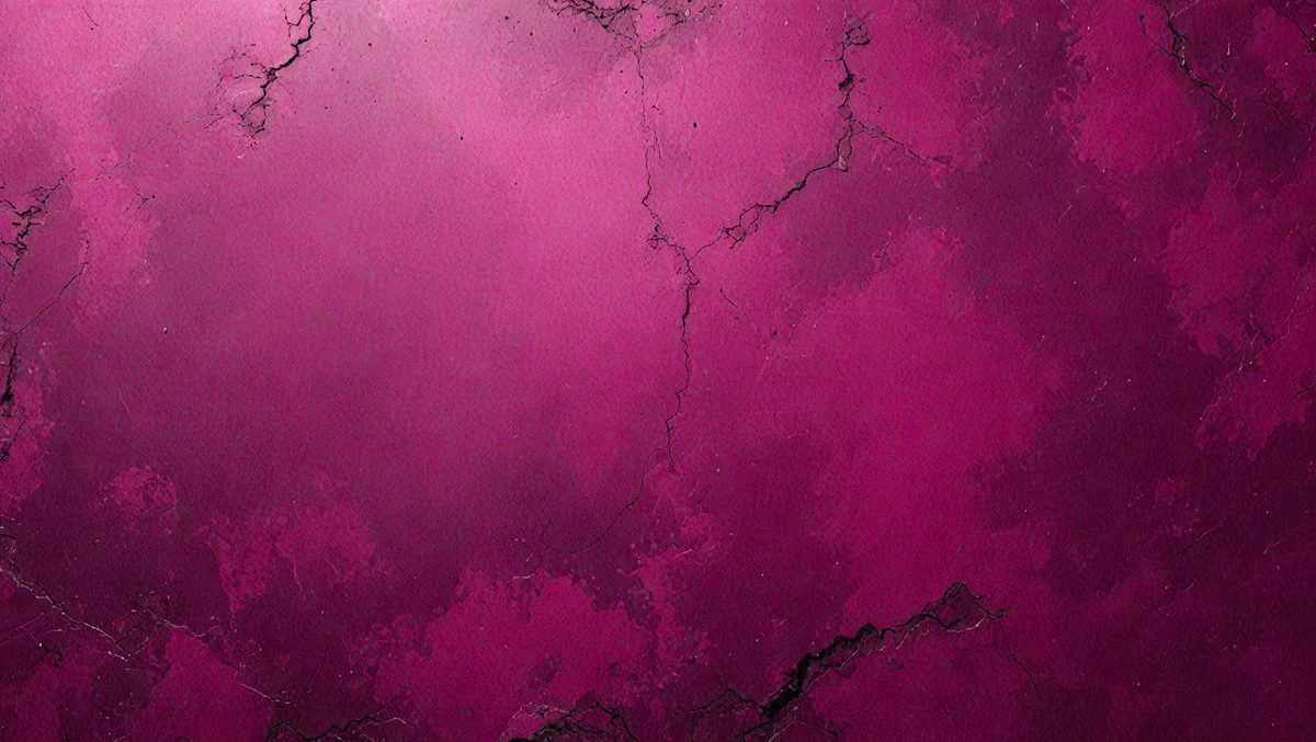 The primary subject of the image is a close-up of a purple wall with a pinkish hue. The setting is a room with a purple wall, and the visual style appears to be a photo. The dominant colors in the image are purple and pink, creating a warm and inviting atmosphere.