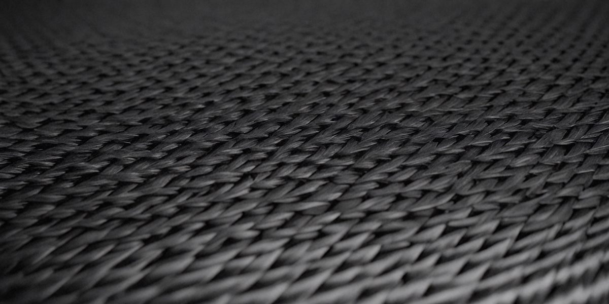 15be5497-2846-4fa7-94cf-33908ddf2993-freepik__carbon-fiber-texture-for-background-cinematic-angl__88796_250525071906_00001.png