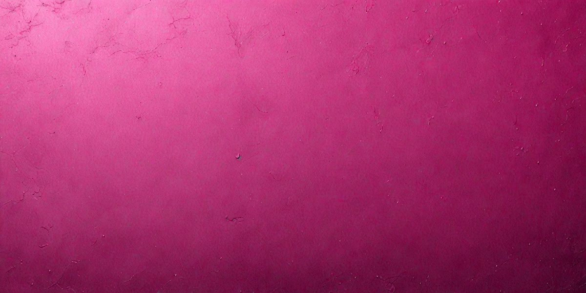 The primary subject of the image is a pink wall with a purple hue. The setting is a room with a pink background. The visual style is a close-up of the wall, showcasing its texture and color. The dominant colors are pink and purple, creating a warm and inviting atmosphere.