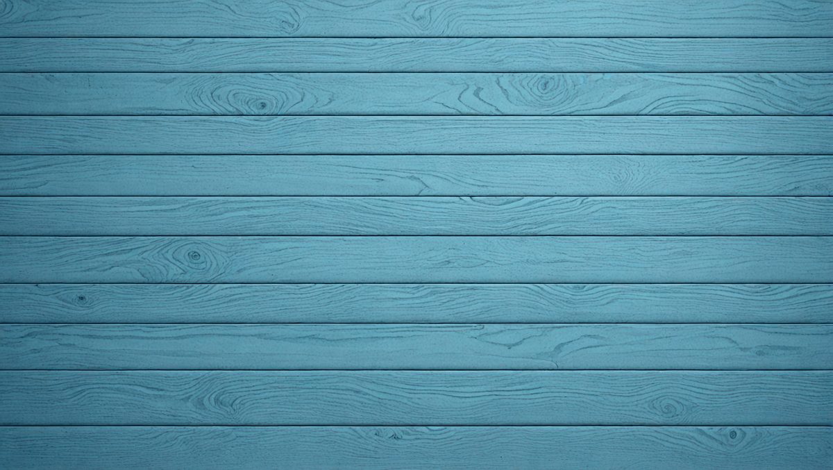 The primary subject of the image is a blue wooden wall. The setting is a room with a blue wooden wall, and the visual style is a photo. The dominant colors are blue and wood, creating a calm and serene atmosphere.