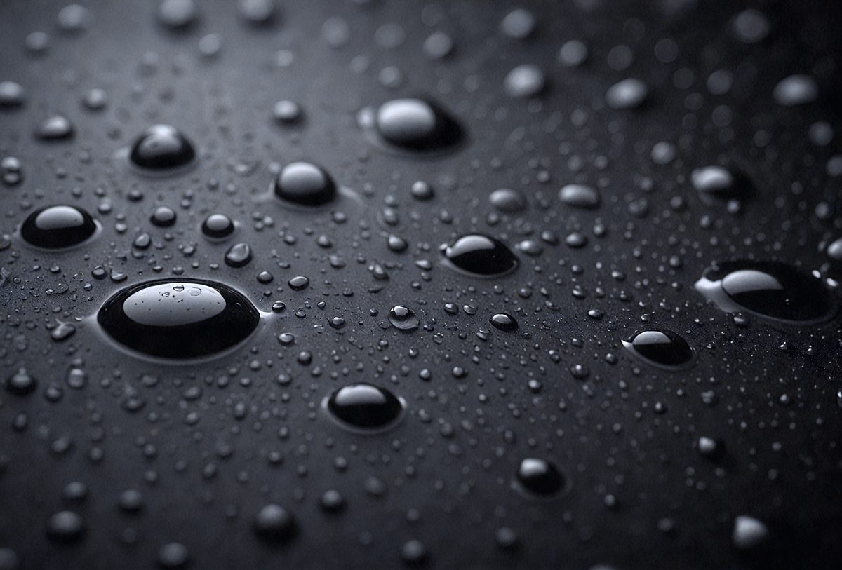 2740493a-375e-4a3e-9032-845d5d841377-freepik__water-drops-on-a-black-surface-abstract-background__75003_250526014804_00001.png