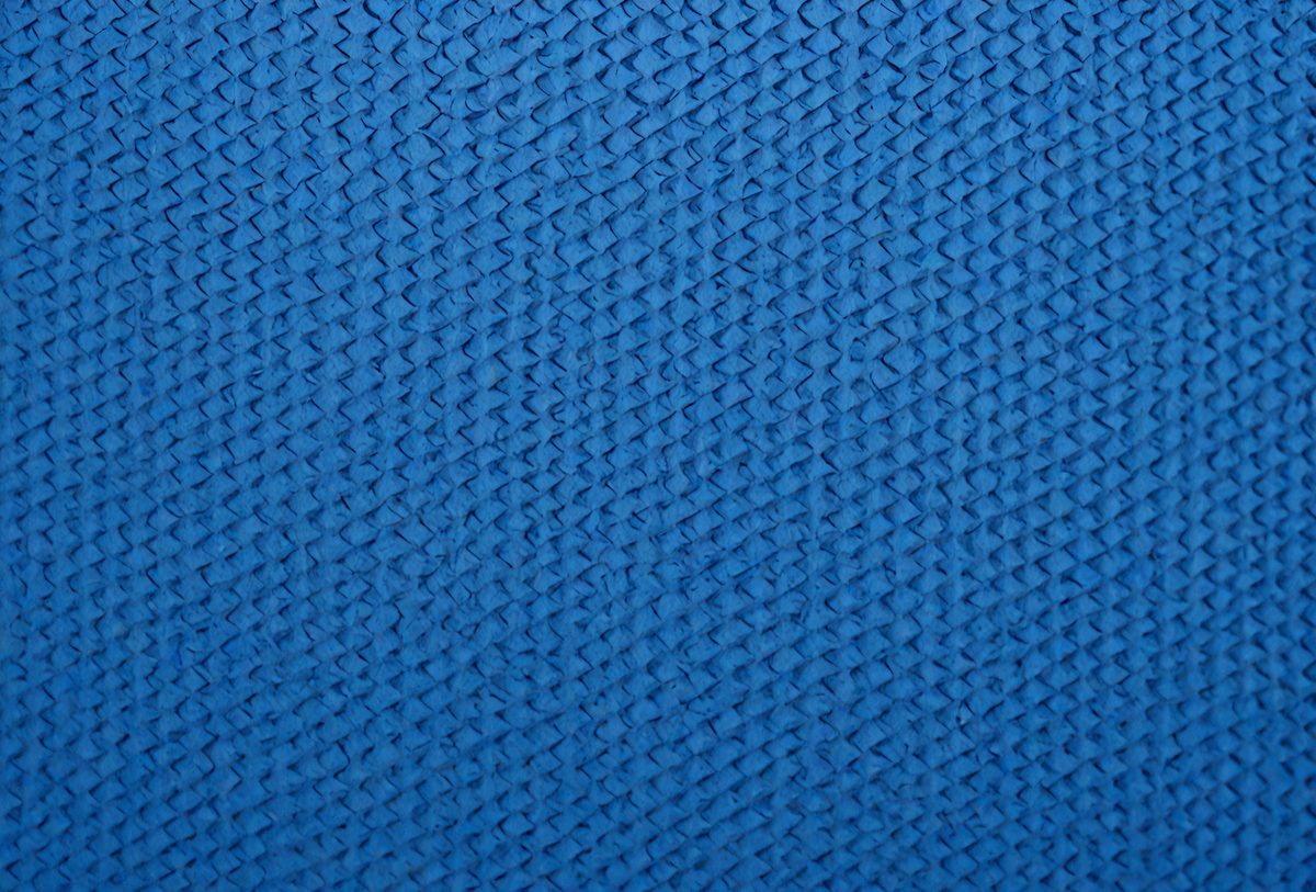 2c31f71d-1832-4cc2-ad79-5795f9a5afe0-freepik__texture-of-blue-rubber-sports-mat-abstract-backdro__57358_250526082725_00001.png