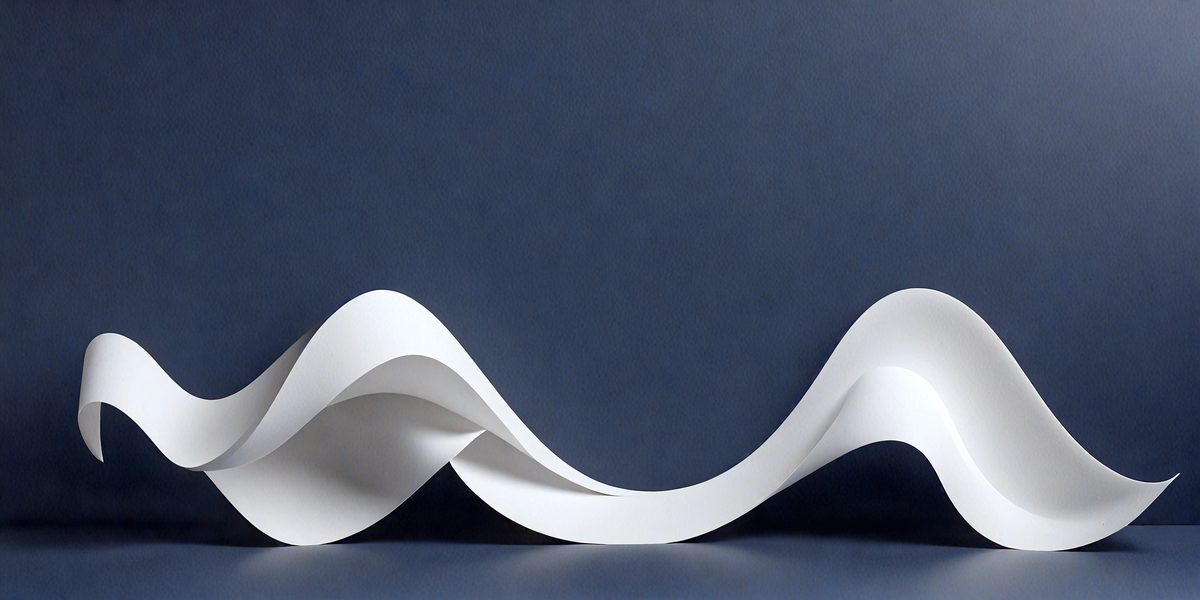 The primary subject of the image is a large, curved sheet of white paper. The paper is folded and appears to be a sculpture or an artistic representation. The setting is a dark blue background, which contrasts with the white paper. The visual style of the image is a close-up of the paper, showcasing its intricate folds and curves. The colors and mood of the image are predominantly dark and moody, with the white paper standing out against the blue background.