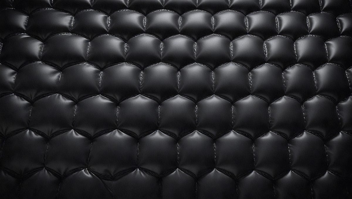 31301b69-8948-4c97-a65c-3bb8a462f8e7-freepik__quilted-black-background-cinematic-angle-compositi__2587_250525211142_00001.png