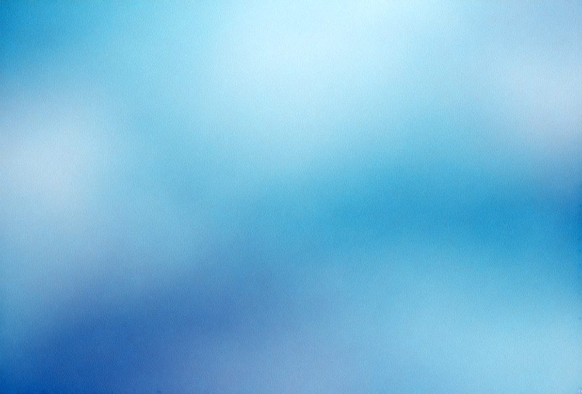 The primary subject of the image is a blue sky with clouds. The setting is a clear day with a cloudy sky, creating a serene atmosphere. The visual style is a natural, outdoor scene. The colors and mood are predominantly blue, with a hint of white from the clouds, giving the image a calm and peaceful appearance.