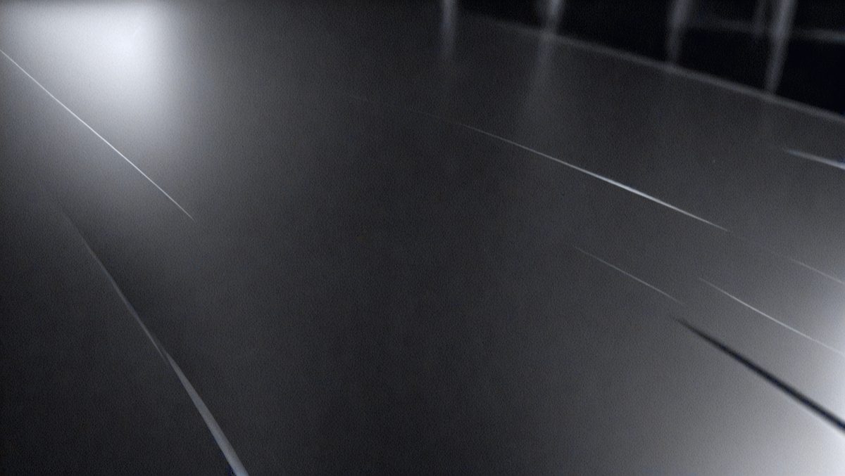 4413fd45-6d60-43ce-bd8c-18c4068e154e-freepik__black-polished-aluminum-background-cinematic-angle__12349_250524225624_00001.png