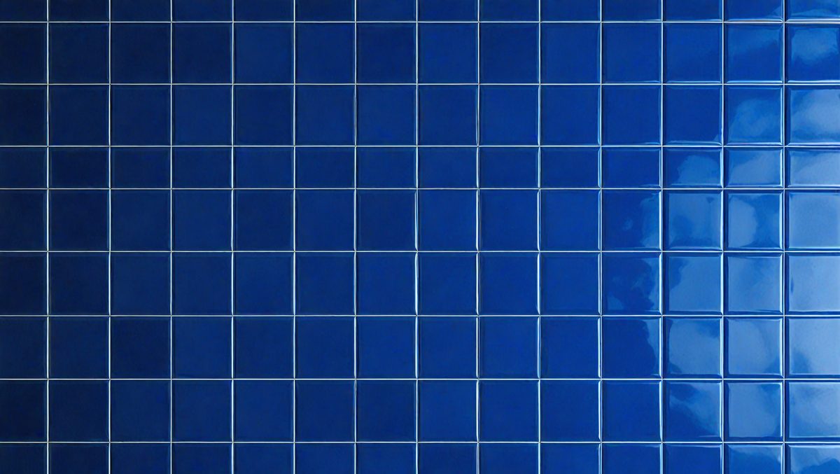 The primary subject of the image is a blue tile wall. The setting is a room with a blue tile wall, and the visual style is a photo. The dominant colors are blue and white, creating a calm and soothing atmosphere.