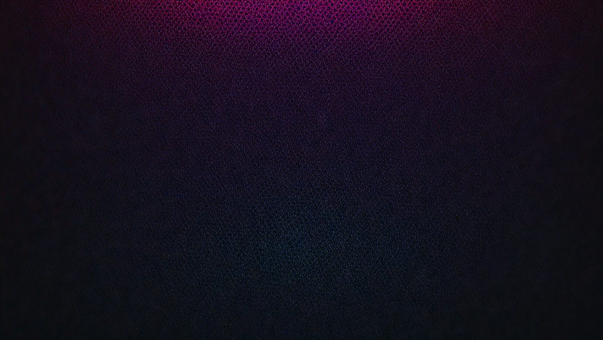 The primary subject of the image is a close-up of a purple and black patterned wall. The setting is a dark room with a purple and black patterned wall. The visual style is a close-up of a patterned wall, which gives the image a unique and artistic appearance. The colors and mood of the image are predominantly purple and black, creating a moody and dramatic atmosphere.