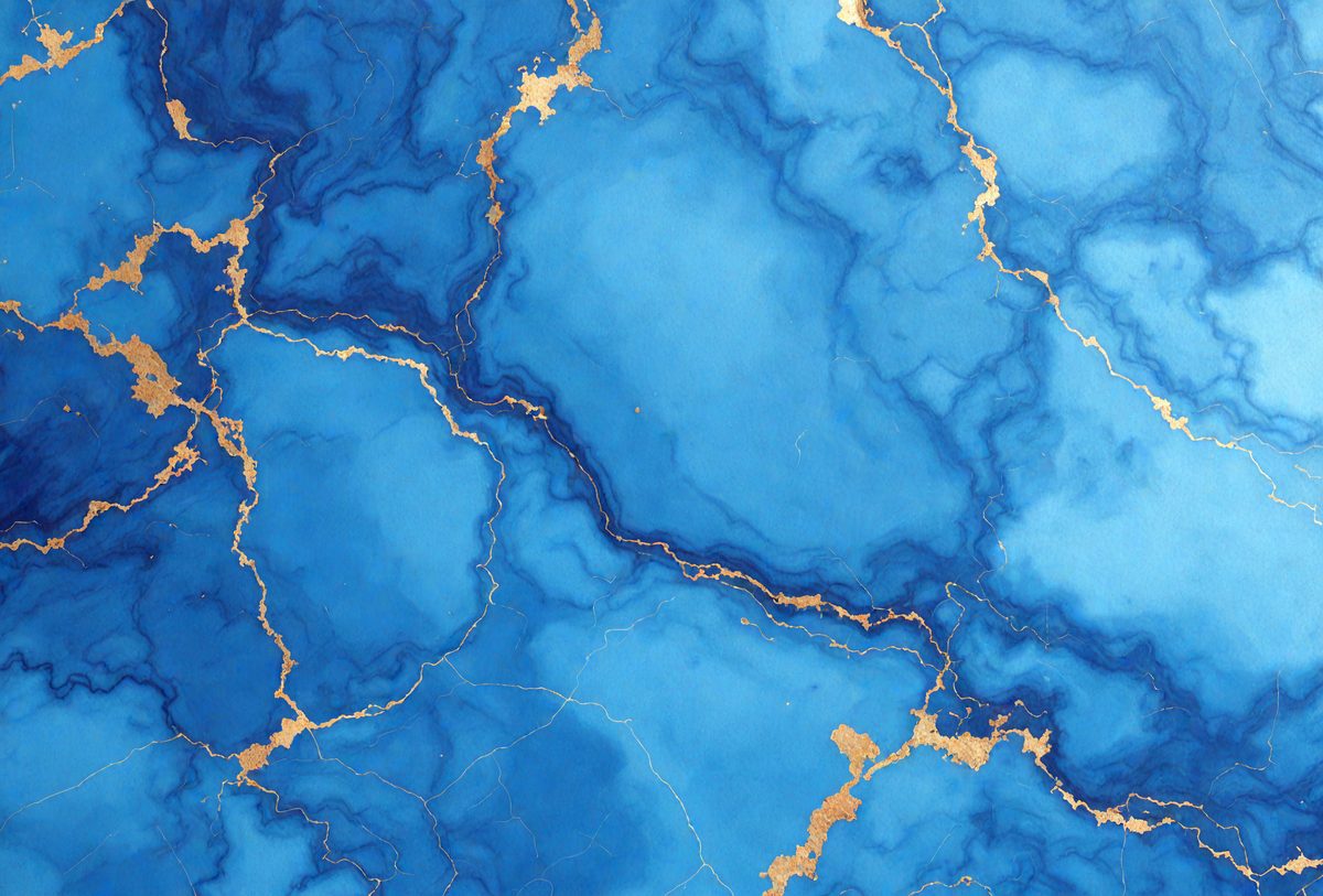 The primary subject of the image is a blue and gold marbled surface, which appears to be a piece of art or a decorative item. The setting is a blue background, which complements the blue and gold colors of the marbled surface. The visual style of the image is a close-up of the marbled surface, showcasing its intricate patterns and textures. The colors and mood of the image are predominantly blue and gold, creating a sense of elegance and sophistication.