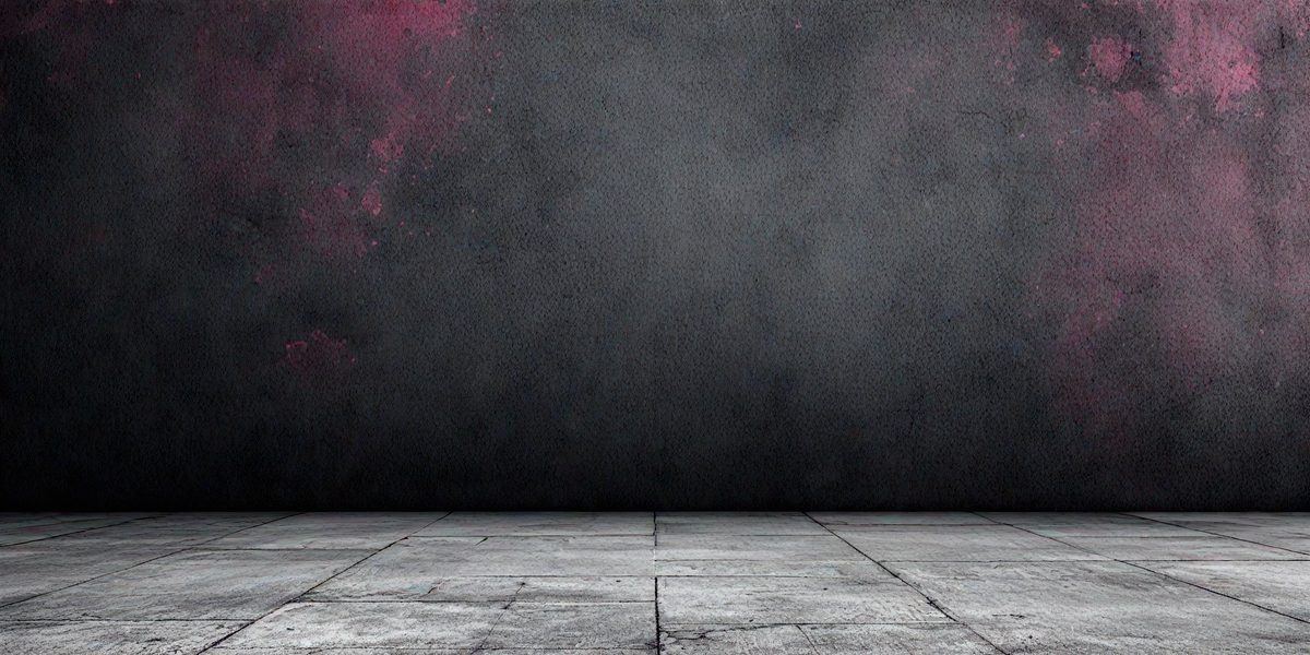 The primary subject of the image is a black wall with a pink background. The setting is a room with a concrete floor. The visual style is a black and white photo. The dominant colors are black and pink, creating a moody atmosphere.
