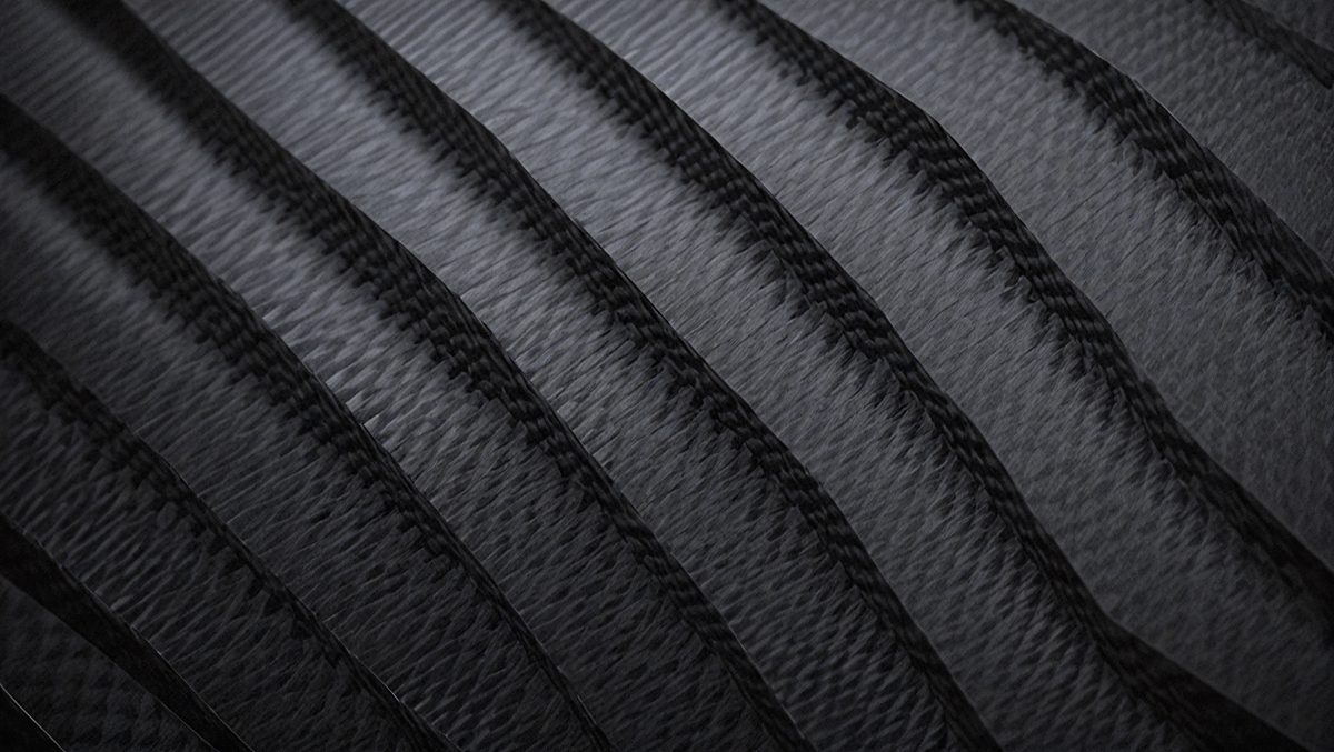 a2efad80-c376-4630-a640-984464c0d839-freepik__black-carbon-fiber-background-and-texture-for-mate__11365_250524181019_00001.png