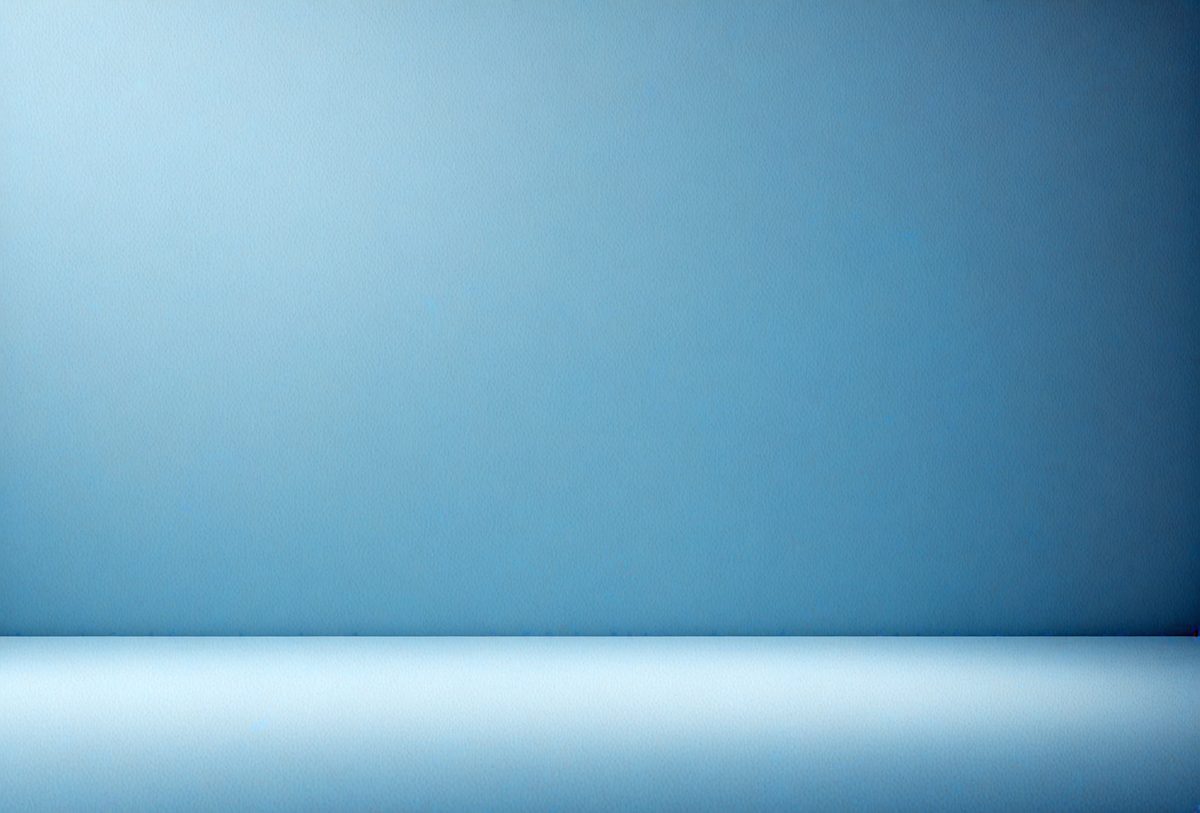 The primary subject of the image is a blue wall. The setting is a room with a blue wall, and the visual style is a photo. The dominant colors are blue, and the overall atmosphere is calm and serene.