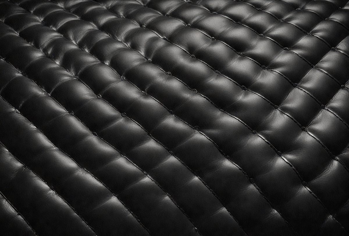 b5a077b4-7786-4835-af63-ce7e6d74cf54-freepik__black-leather-texture-background-cinematic-angle-c__2330_250524223304_00001.png