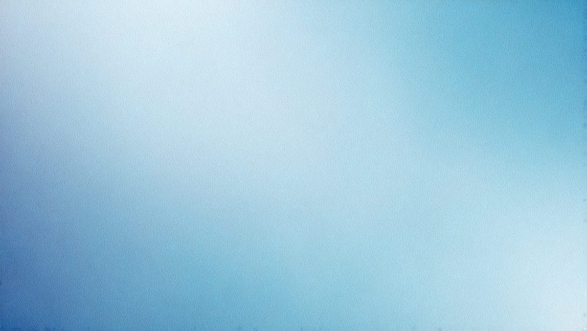 The primary subject of the image is a blue sky with no clouds. The setting is a clear day with a bright blue sky. The visual style is a natural, outdoor scene. The colors and mood are calm, serene, and peaceful.