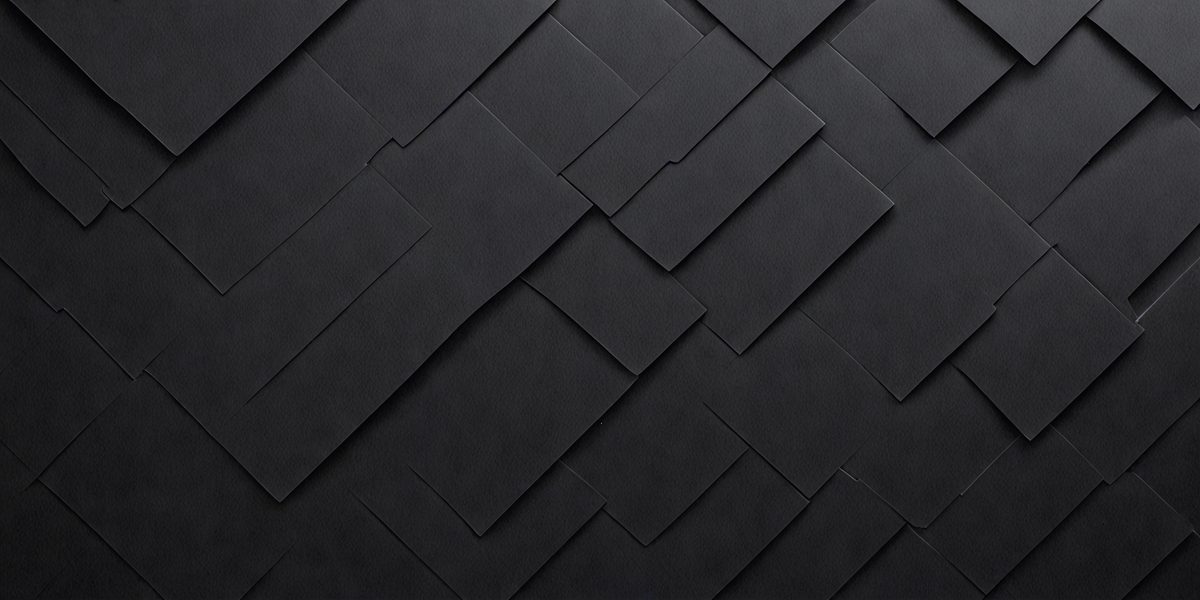 The primary subject of the image is a black and white patterned surface, which appears to be a black leather or a black and white checkered pattern. The setting is a dark room, and the visual style is a close-up of the patterned surface. The colors and mood of the image are predominantly dark and moody, with the black and white pattern creating a sense of depth and contrast.