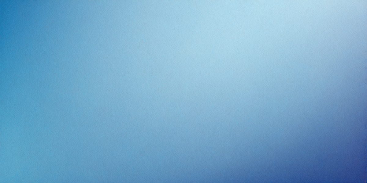 The primary subject of the image is a large, empty blue sky. The setting is a vast, open space with no visible landmarks or objects. The visual style is a natural, untouched landscape. The colors and mood are predominantly blue, creating a serene and peaceful atmosphere.