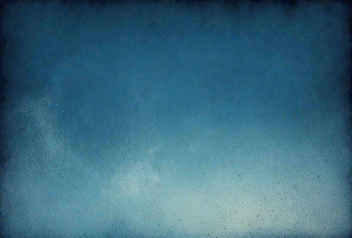 The primary subject of the image is a blue sky with clouds. The setting is a clear day with a cloudy sky, and the visual style is a photo. The dominant colors are blue and white, creating a calm and serene atmosphere.
