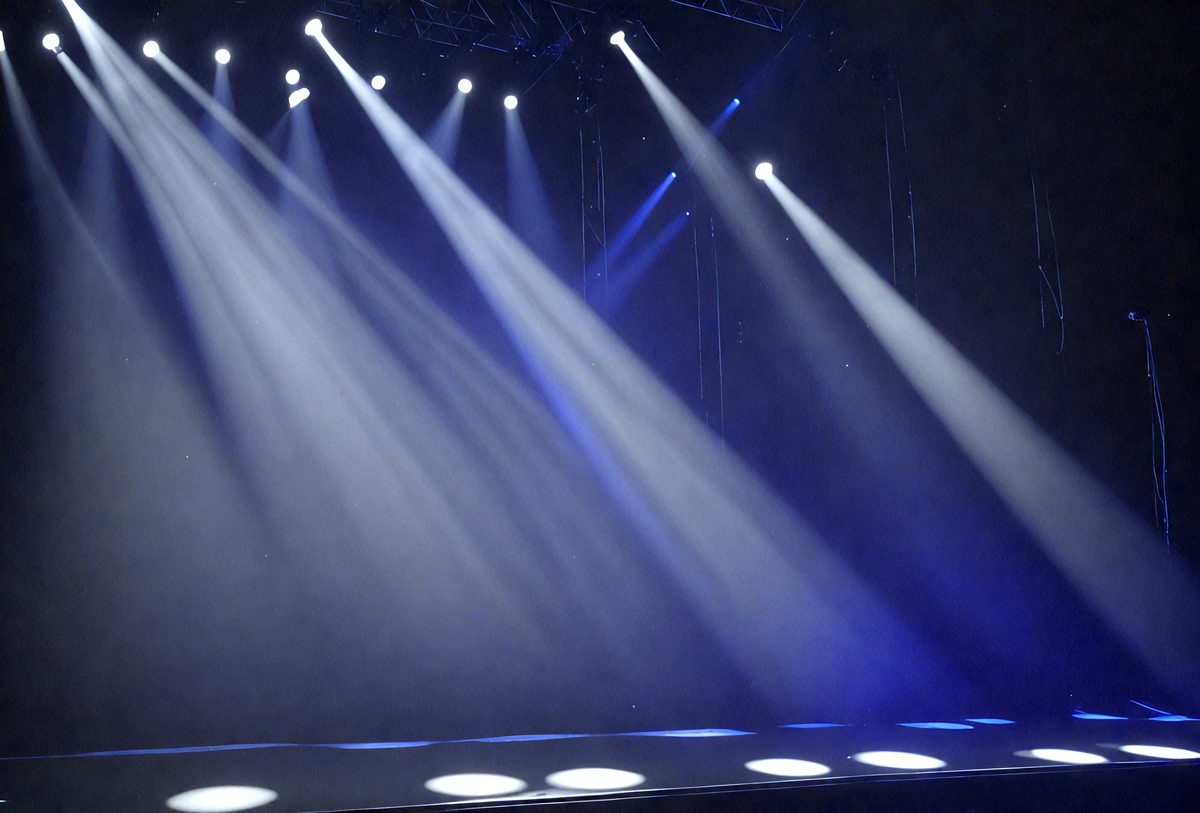 freepik__blue-lights-of-the-spotlight-from-the-stage-at-a-c__87672_250610091956_blue_00001.png
