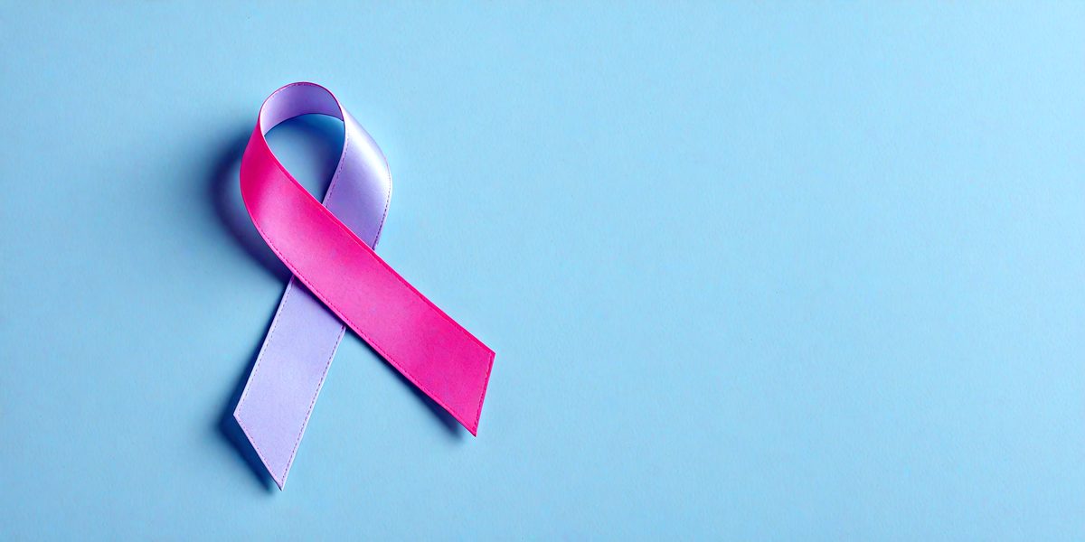freepik__breast-cancer-awareness-ribbon-on-blue-powder-colo__5284_250922071530_00001.png