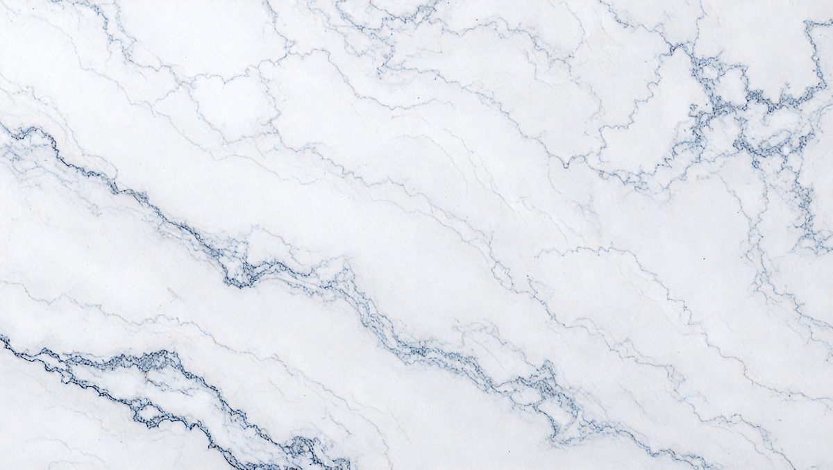 The primary subject of the image is a marble surface with a white and blue color scheme. The setting is a white marble wall, and the visual style is a close-up of the marble surface. The colors and mood of the image are predominantly white and blue, creating a clean and elegant atmosphere.