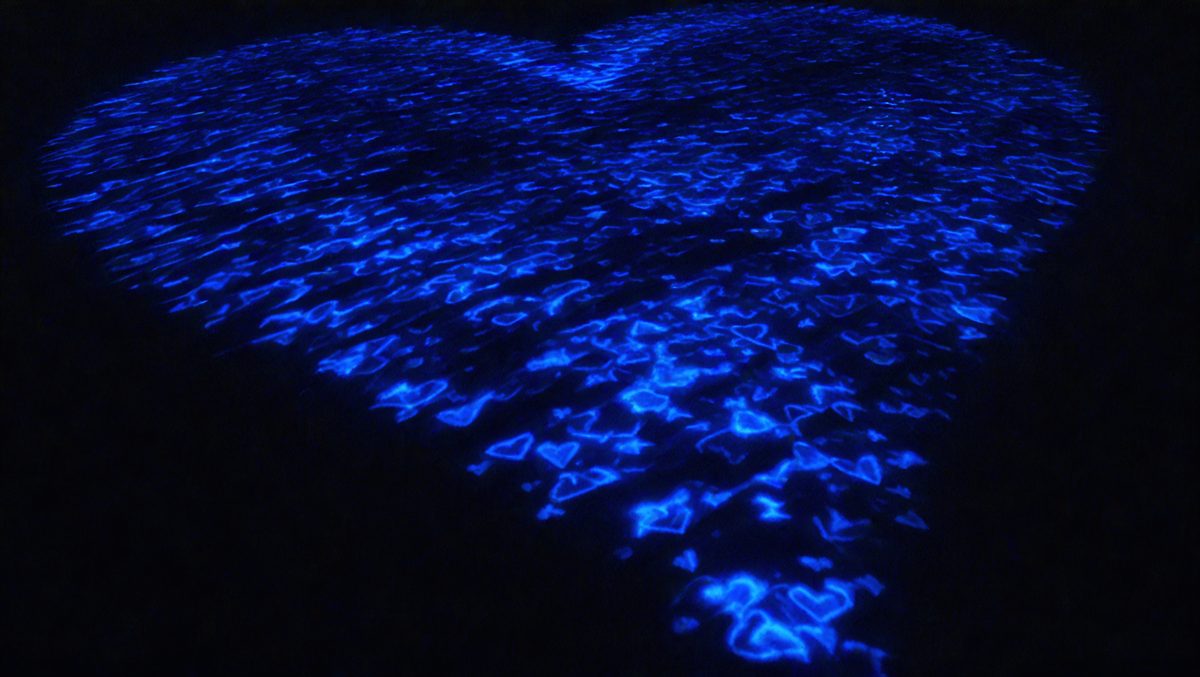 freepik__cadet-blue-heart-pattern-projected-onto-a-rippled-__26059_250923212022_00001.png