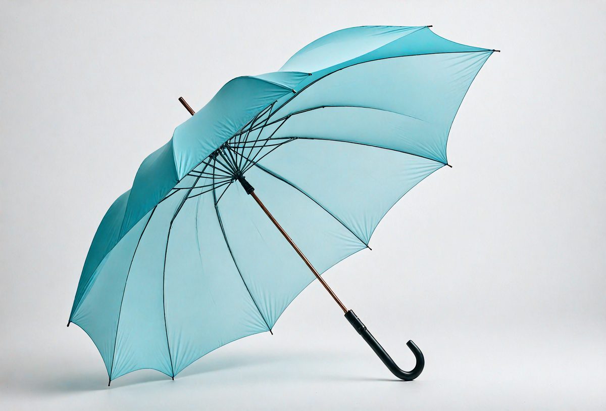 freepik__open-umbrella-in-cyan-fabric-against-white-backdro__13799_250929053811_00001.png