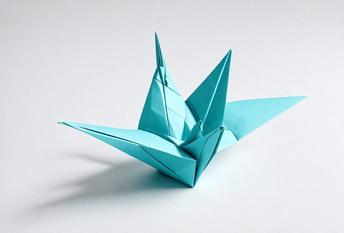 freepik__origami-paper-crane-folded-in-cyan-paper-on-white-__13424_250929053951_00001.png