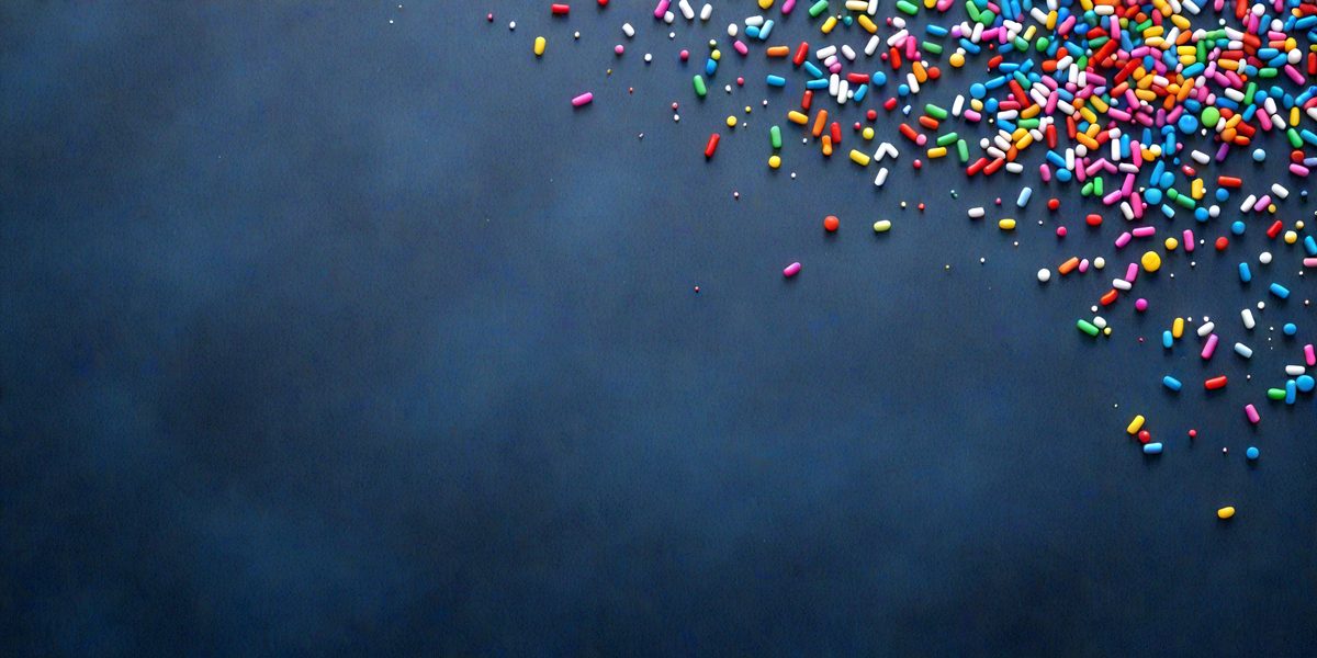 freepik__rainbow-sprinkles-on-dark-slate-blue-background__36787_251013015519_00001.png