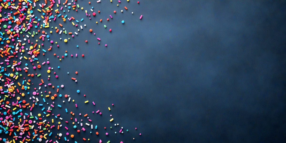 freepik__rainbow-sprinkles-on-dark-slate-blue-background__36788_251013015523_00001.png