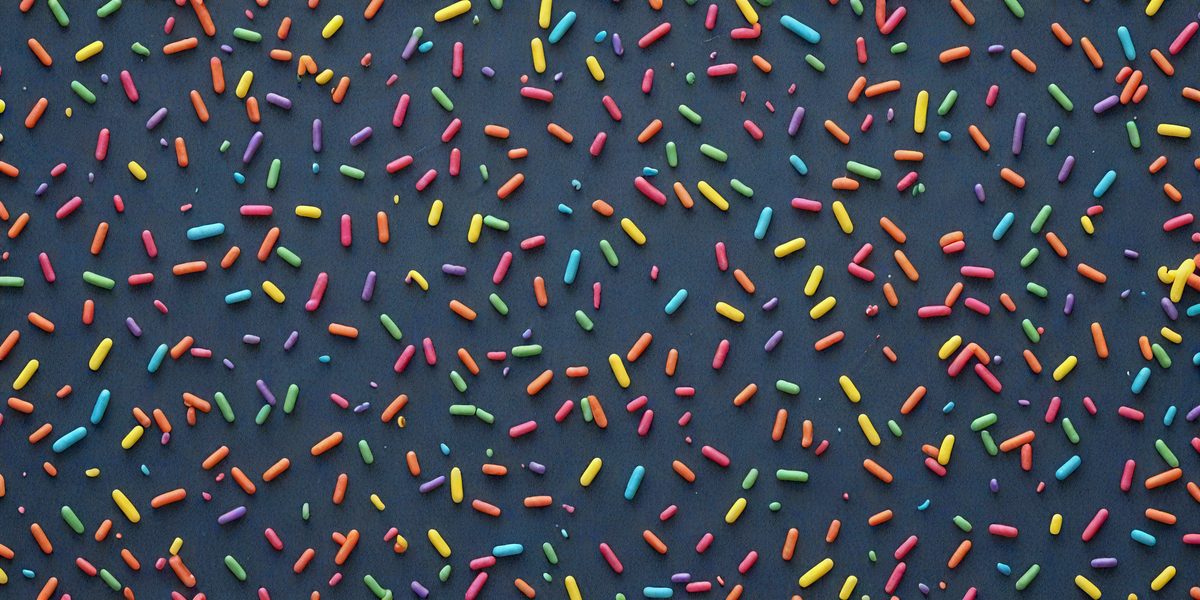 freepik__rainbow-sprinkles-on-dark-slate-blue-background__36793_251013015546_00001.png